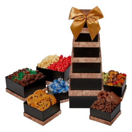 A specatcular six-tier gift tower packed with the most delicous sweet treats, including cookies, popcorn and an assortment of chocolate goodies. Gift basket tower comes wrapped in cellophane with a bow on top. 